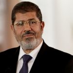 Former president of Egypt dies in court during trial