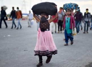 May Day: “At home, I can live with dignity,” Migrant workers in New Delhi flee amid massive surge in Covid cases