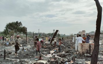“They want us out of here,” Rohingya refugees displaced by massive fire at Delhi camp stare at uncertain future