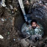 Two photojournalists on what they learned while documenting manual scavenging