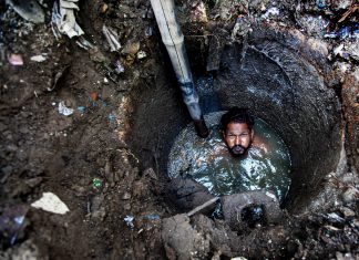 Two photojournalists on what they learned while documenting manual scavenging