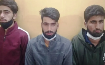 Why are three Kashmiri students in jail after court granted them bail?